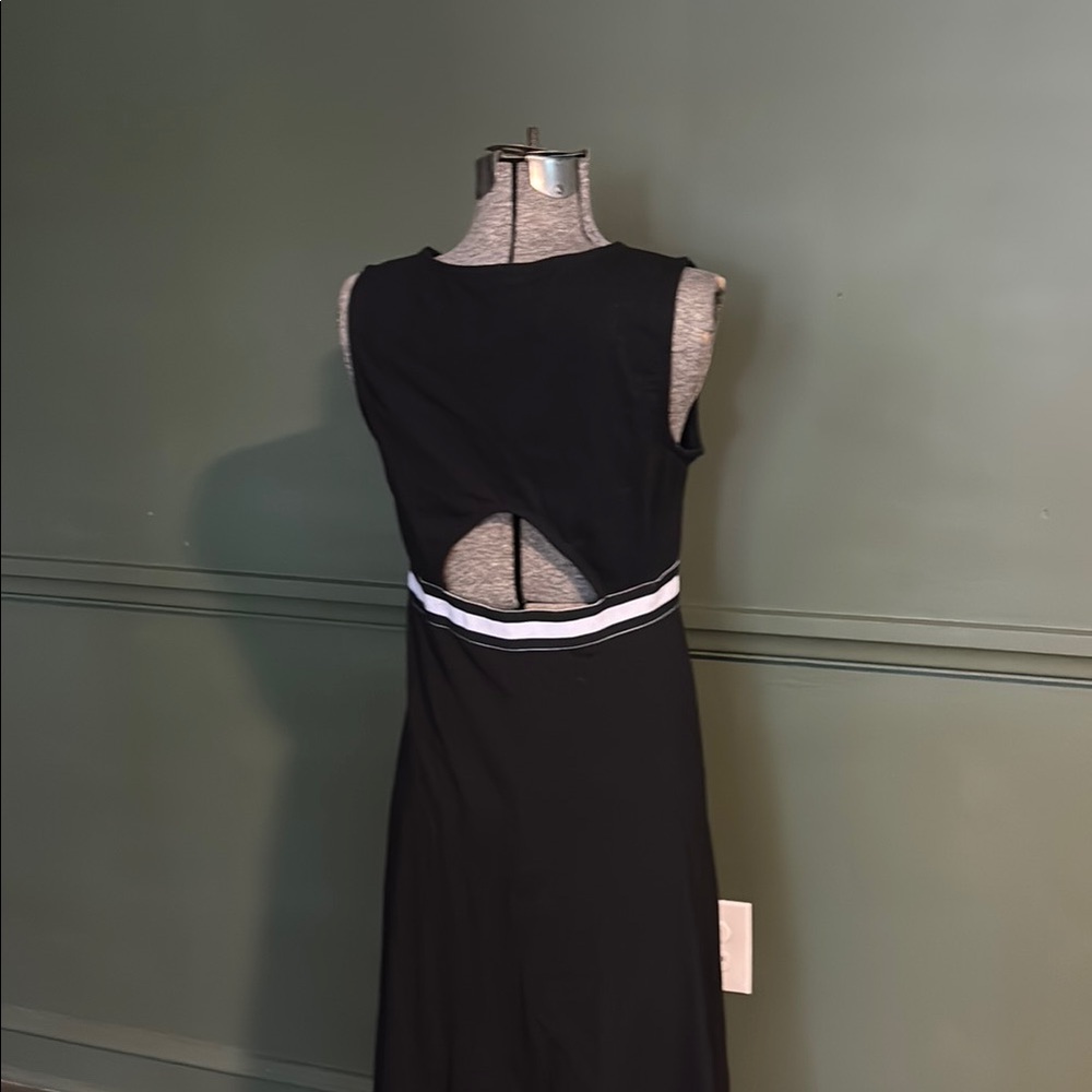 Back cut out fit and flare dress! Super cute and timeless!